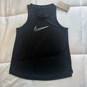 Nike Black Sleeveless Dri-fit Top with white logo. New with tags.  Kid Large